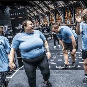FiiTUK participants taking part in a HYROX-style fitness session for health.
